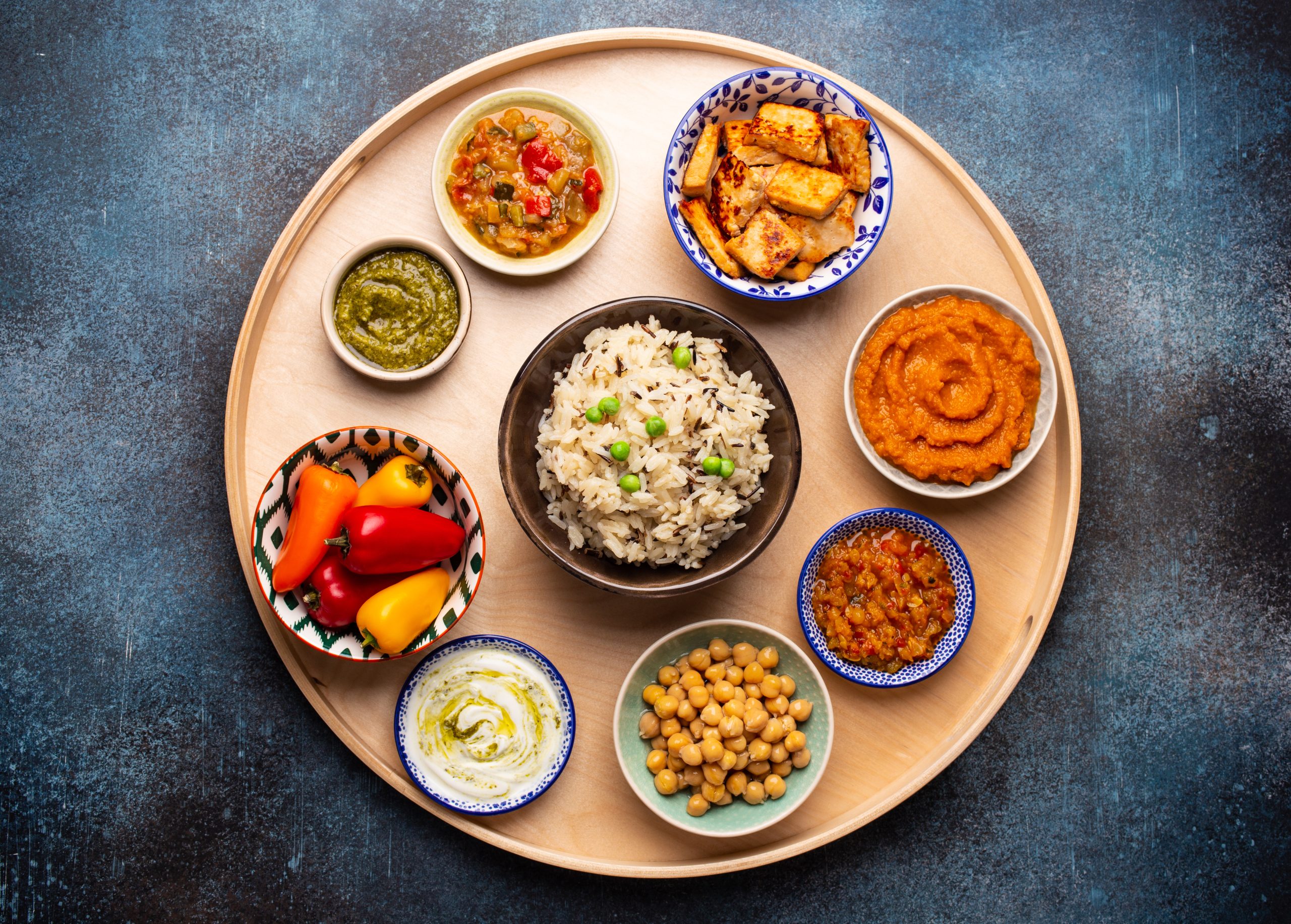 Indian Thali - selection of various dishes served on round woode